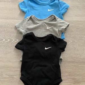 #6 Set of 3 Nike bodysuits.